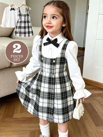 Casuvi Kids Girls' Spring/Autumn Plaid Pinafore Dress & Shirt 2-Piece Set, Puff Sleeve White Shirt With Black Bow Tie & Black And White Plaid Waist-Cinching Pinafore Dress, Perfect Matching Outfit, Preppy Sweet Style Girls' Clothing Set