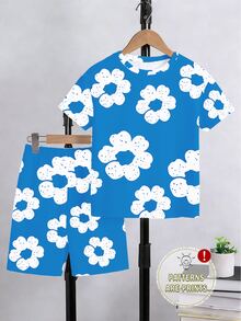 SHEIN Coolqubz Conjunto de camiseta básica de manga corta y pantalones cortos con estampado de flores blancas grandes sobre base azul, de estilo minimalista y personalidad creativa, para niños, para uso casual en primavera y verano, cómodo para el uso diario - Multicolor - Ver 4