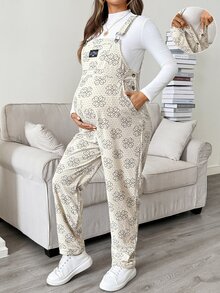 SHEIN جمبسوت كاجوال للحوامل بنقشة زهور وطباعة حروف للخريف - كاكي - مشاهدة 1