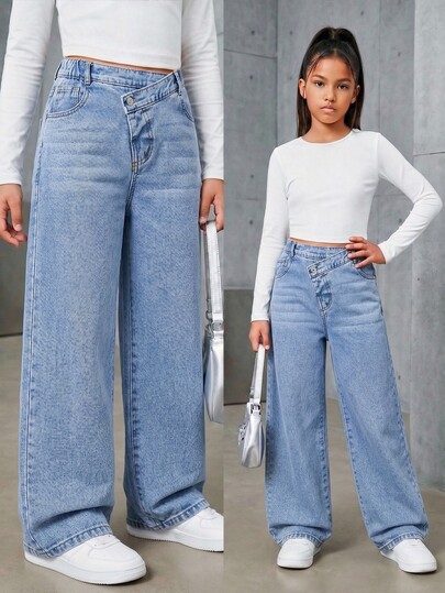 SHEIN Girls' Light Blue Denim Jeans, Elastic Waist With Slanted Waistband Design, Straight Leg Wide Leg Fit, Suitable For Spring And Autumn, Can Be Paired With T-Shirts, Shirts Or Knitwear, Suitable For Daily Commute, Casual Shopping And Other Scenes, Classic Washed Blue Color, Loose And Comfortable Fit