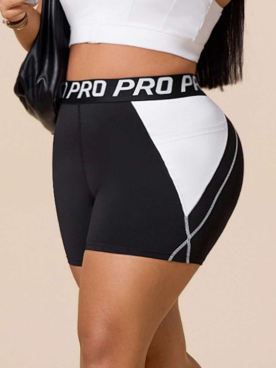 SHEIN Rhythm Era Women's Plus Size Colorblock Patchwork Sports Shorts - Black and White - View 1