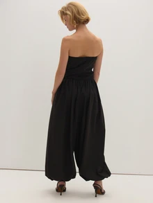 MUSEYN Jumpsuit Hitam Model Bandeau dengan Kaki Mengembang - Hitam - View 4