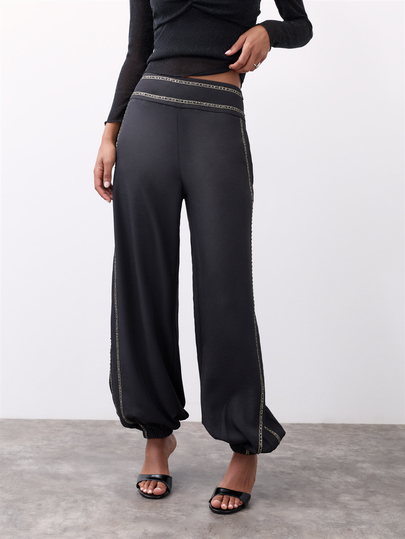 Nöista Black Medium Waisted Balloon Trousers With Gold Trim Detailing Around. Fall, Winter, Everyday Look, Office, College, Elegant, Night Out, Festival,.