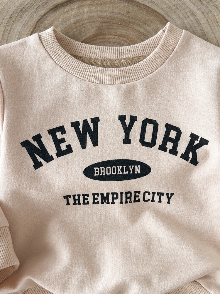 SHEIN Baby Girl 0-3y Spring/Autumn Apricot Letter Print Long Sleeve Top And Black Flared Pants 2-Piece Set, Cute Comfortable Minimalist Style, Suitable For Indoor And Outdoor Activities - Multicolor - View 7