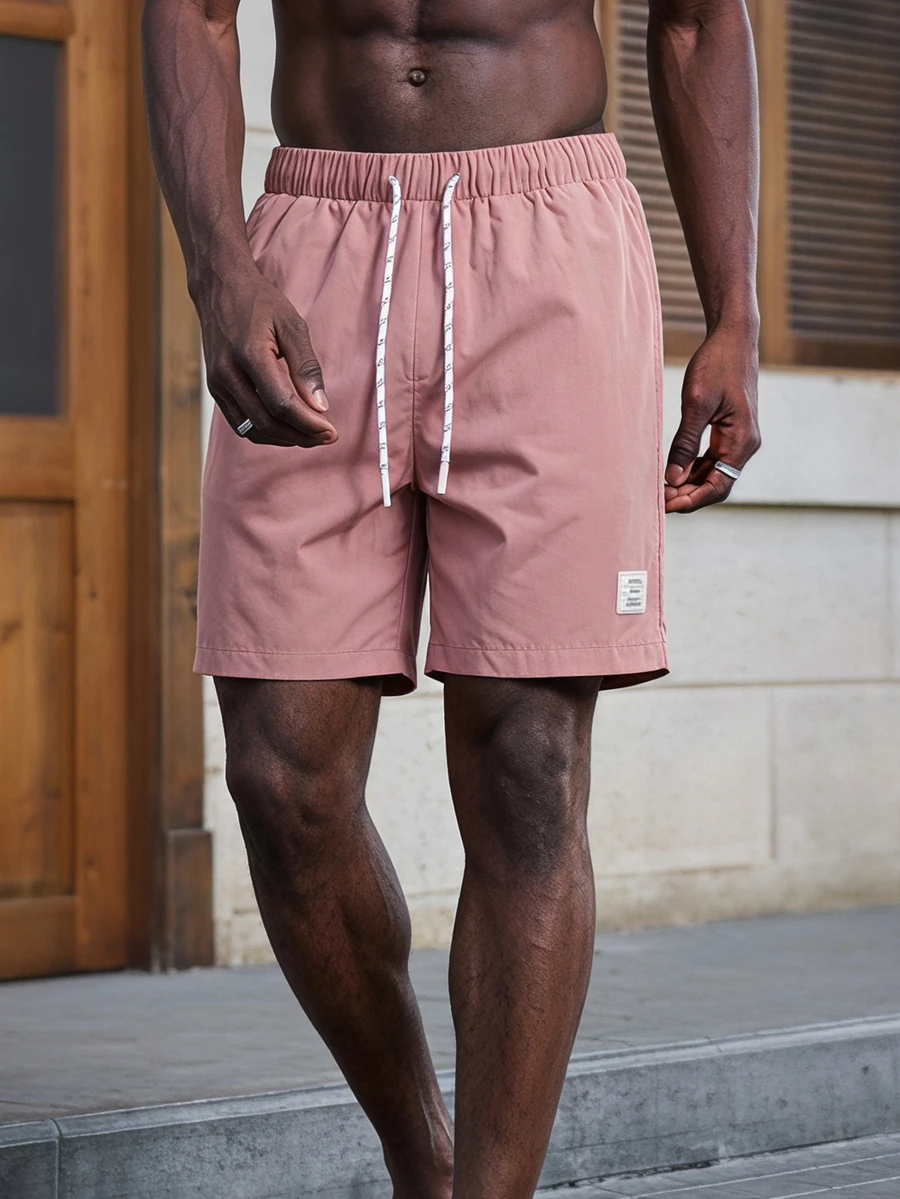 Mainfolk Men's Loose Fit Letter Patched Drawstring Shorts - Coral Pink - View 1