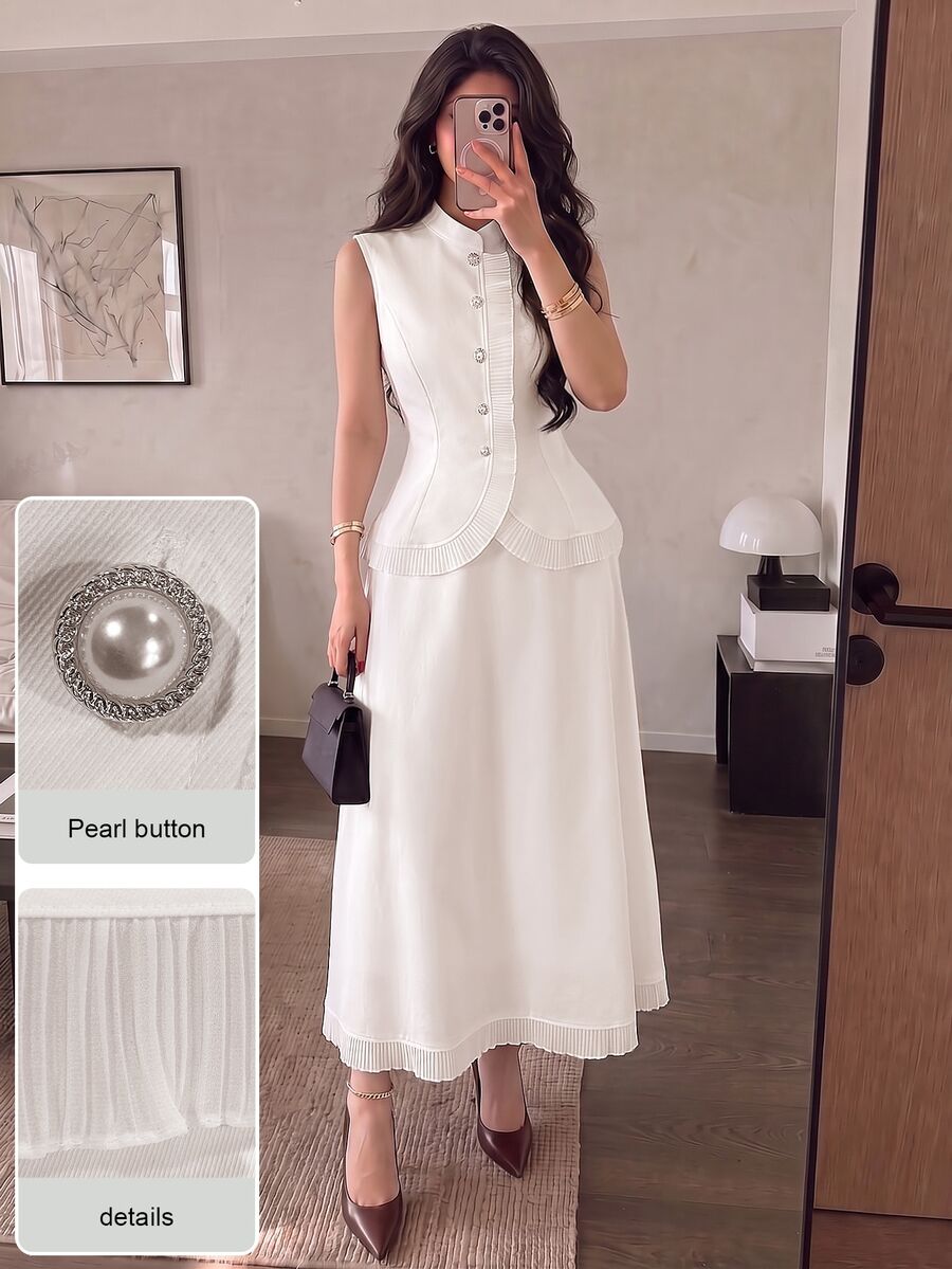 Modelyn Setelan Blazer Elegan dan Awet Muda Gaya Prancis untuk Wanita, Atasan Tanpa Lengan dengan Kerah Tegak dan Hiasan Ruffle yang Melangsingkan serta Rok Mengembang.