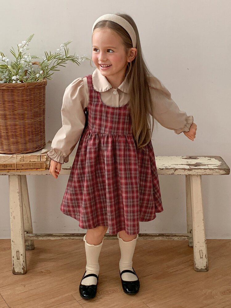 Dazy Kids فستان بناتي صغير بنقشة مربعات مع حافة مكشكشة وياقة بيتر بان لطيف 2 في 1 للخريف - لون مشمشي - مشاهدة 2