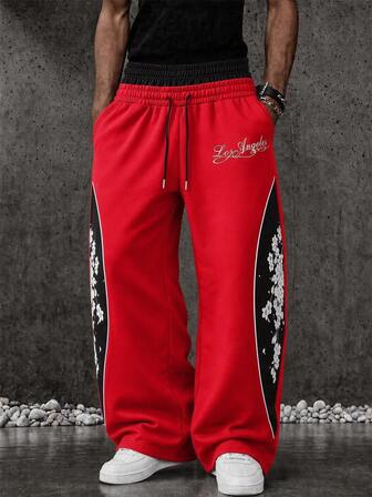 Pantalon de sport long pour homme avec imprimé floral script cerisier en fleurs et blocs de couleurs, double ceinture