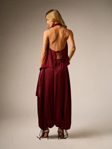 AiiRZ Satin Halter Neck Blouse And Wide Leg Balloon Pants Co-Ord Set With Asymmetric Hem And Elasticated Ankle Detail - Burgundy - View 3