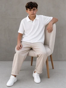 Teen Boys 2026 Casual White Textured Short Sleeve Polo Top + Light Khaki Long Pants Set, Back To School, For Daily Commute, Beach Vacation, Summer - White - View 1