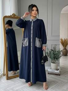 Al Najma 大尺碼秋冬長版襯衫洋裝，海軍藍主色搭配格紋對比拼接設計，經典翻領、門襟與袖口飾細格紋布料拼接，長袖寬鬆舒適，全開襟鈕扣設計，兩側附抽繩裝飾大口袋，兼具美感與實用，寬鬆A字版型運動衫洋裝 - 藏蓝色 - 查看 1