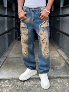Manfinity EMRG Celana Jeans Denim Gaya Jalanan Amerika Unisex dengan Bordir dan Ujung Berumbai - Biru - View 1