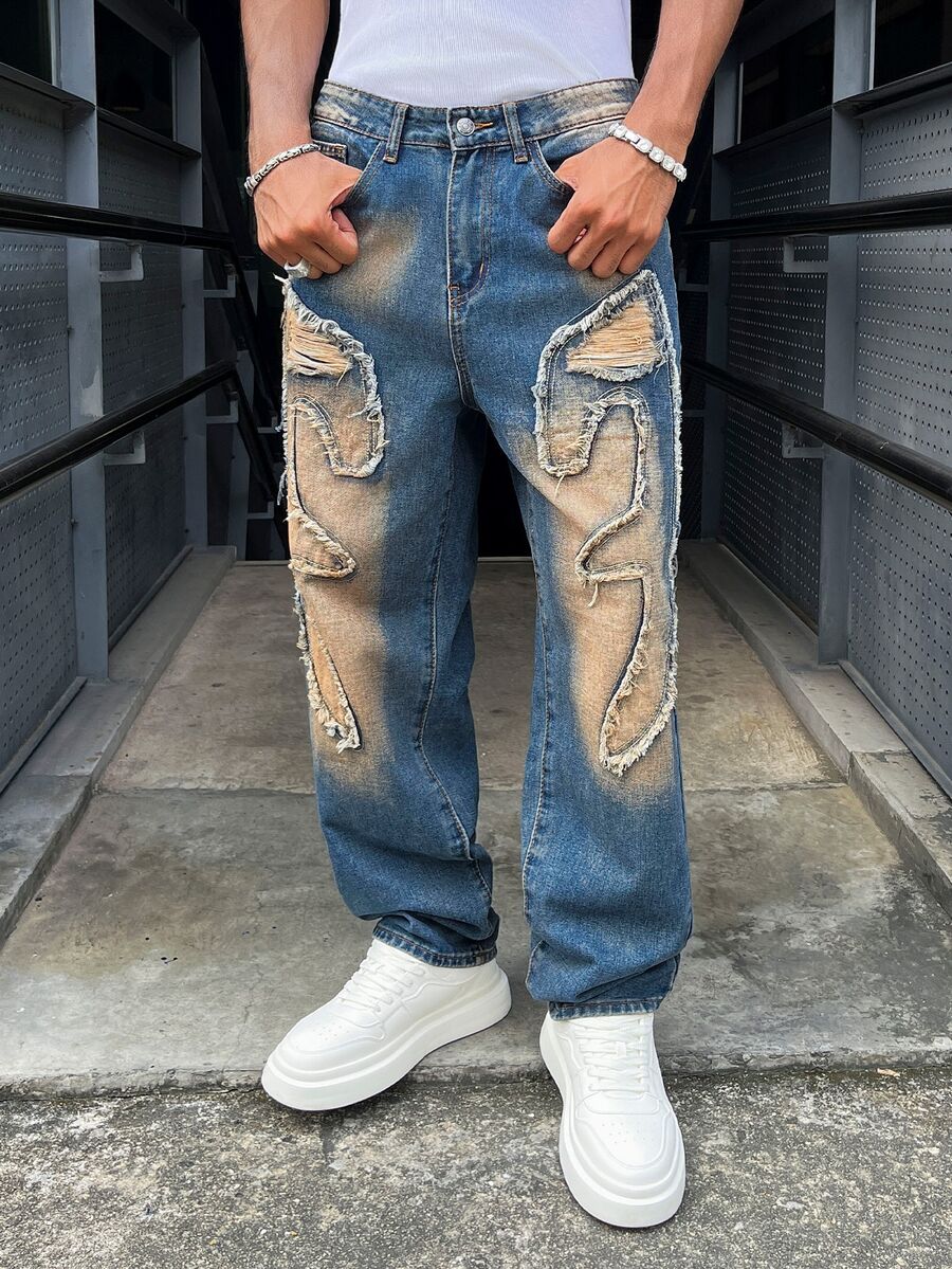 Manfinity EMRG Celana Jeans Denim Gaya Jalanan Amerika Unisex dengan Bordir dan Ujung Berumbai - Biru - View 1