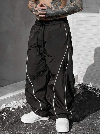 SLATEMANN Pantalones largos negros para niños, pantalones casuales de estilo urbano holgados, pantalones tipo paracaídas con rayas de letras