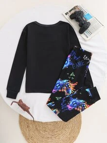 SHEIN طقم ملابس منزلية محبوكة للأطفال والفتيان المراهقين من قطعتين، كاجوال يومي مريح، بطبعة ونقشة، بياقة دائرية، ملابس علوية علوية وبنطال، بقصة ضيقة - الأسود - مشاهدة 2