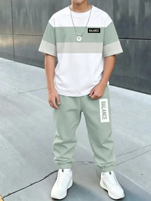 Conjunto de camiseta de cuello redondo de manga corta y pantalones largos casual, cómodo y de moda minimalista para niño preadolescente, estampado clásico y fresco de patrón de cuadros divididos, estampado de texto de logotipo pequeño y exquisito, adecuado para la temporada de otoño/invierno de vuelta al colegio - Blanco - Ver 2