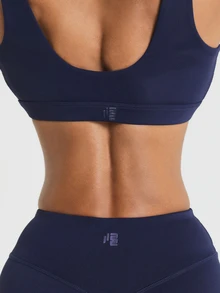 11SKNDS V-Neck Sports Bra With Wide Elastic Underband And Deep Scoop Back Design, Featuring Removable Cups With Sweat-Wicking, Stretchy, Breathable, Buttery-Soft & Low Impact Support, For Gym Workout Fitness Yoga Pilates Studio, Running, Training & Hy-Rox - Navy Blue - View 5