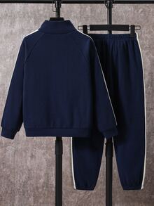 SHEIN 2-delat set för barn och tween-pojkar, avslappnad sportig college-stil, långärmad topp med stående krage, knäppning fram och webbningstrim längs sidsömmen, samt enfärgade trikåbyxor med webbning vid muddarna - Kungsblått - Visa 3