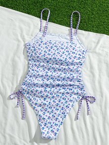 Swim Mod 女士连体泳衣，适合夏季海滩和休闲度假——温柔、复古、甜美又浪漫。采用双印花设计：小碎花图案搭配格子图案。侧边抽绳设计，露背剪裁，修身显瘦。是海滩、海边出游的理想之选；也是女士春秋季泳装的完美之选。 - 彩色 - 查看 6