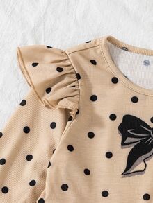 SHEIN Elladie kids 女童淺粉色圓點長袖上衣搭配純黑色長褲，肩部飾有精緻荷葉邊，身前大膽黑色蝴蝶結圖案，下擺喇叭A字剪裁，柔和淺粉與純黑對比，甜美可愛，簡約經典，適合秋冬穿著 - 咖啡棕 - 查看 8