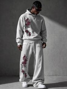 Manfinity EMRG 男士灰褐色彼岸花印花連帽衛衣與喇叭運動褲2件套，Y2K哥德風街頭休閒套裝，酒紅色彼岸花花卉印花長袖連帽運動套裝，適合外出、演唱會、節日派對 - 灰色 - 查看 2