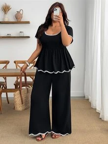 Enliva طقم نسائي مقاس كبير من قطعتين بتصميم موجة وقلب، أكمام قصيرة وألوان متباينة، خصر مشدود وحافة A-Line، ملابس كاجوال للتنقل، أسلوب الربيع/الصيف، مناسب للارتداء اليومي والكاجوال والتنقل، مناسب لشكل الجسم التفاحي والمستدير - أبيض وأسود - مشاهدة 4