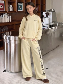 SHEIN طقم كاجوال مريح للمراهقات للخريف، هودي بأكمام طويلة مطبوع عليه حروف وبنطال رياضي، ملابس عطلات - أصفر - مشاهدة 6