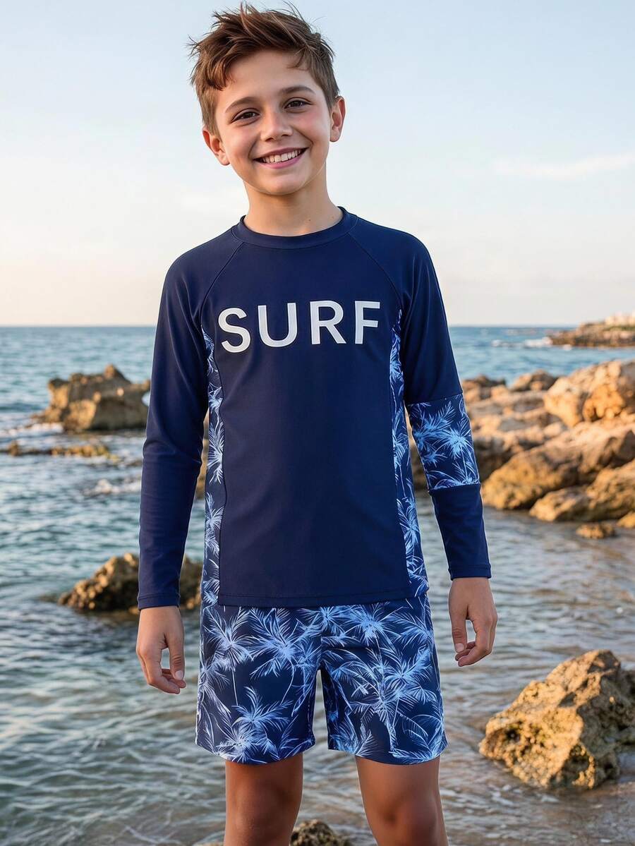 SHEIN 大童男孩泳裝,海軍藍椰子樹印花防曬衝浪衣搭配短褲,夏季休閒熱帶度假海灘穿著,適合8歲男孩 - 彩色 - 查看 1