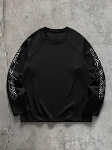 AXEPEAK Men's Long Sleeve Crew Neck T-Shirt, Black And White Color Block, Handwritten English Print, Loose Fit - Black - View 6