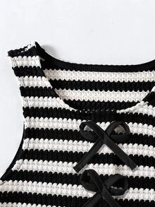 SHEIN Sparklyn ملابس خريفية للفتيات المراهقات بأكمام طويلة، طقم علوي خريفي من قطعتين، ملابس علوية قصيرة بدون أكمام باللونين الأسود والأبيض مع فيونكة، شورت قصير بكشكشة، طقم ميني... - أبيض وأسود - مشاهدة 5
