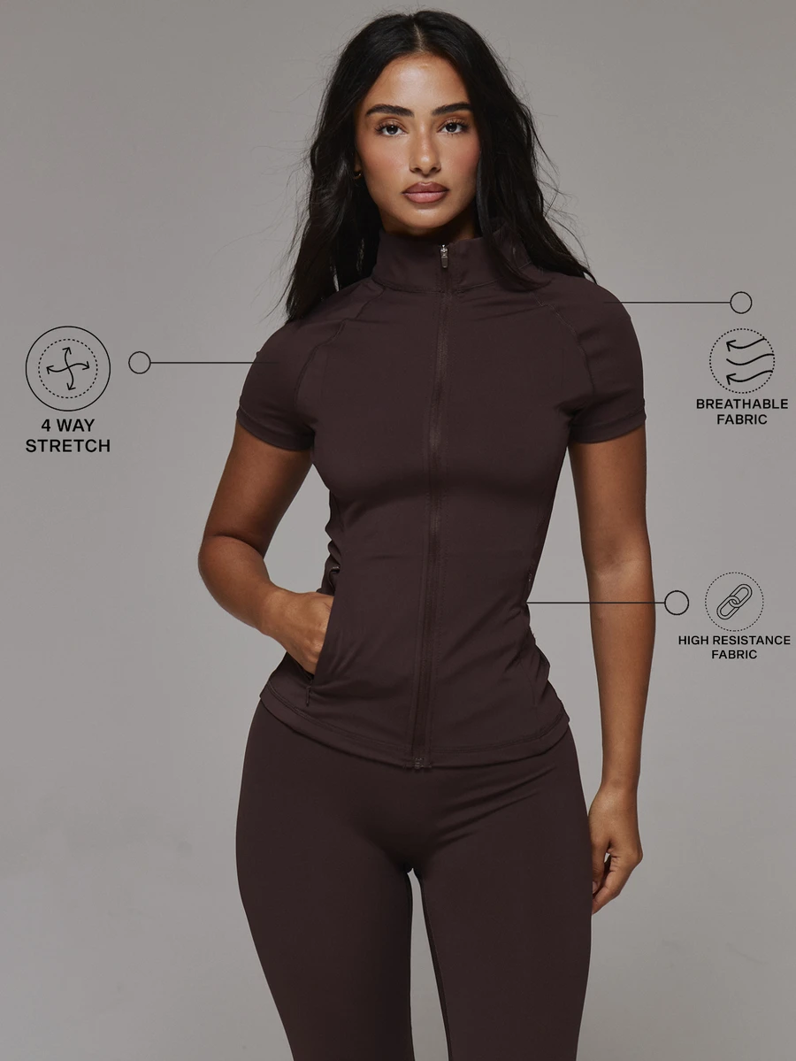 Musera Sport Zip Through High Neck Short Sleeve Logo Back Fitted BBL Active Jacket Sport Essentials Basics Gym Workout Autumn Fall Winter - Coffee Brown - View 1