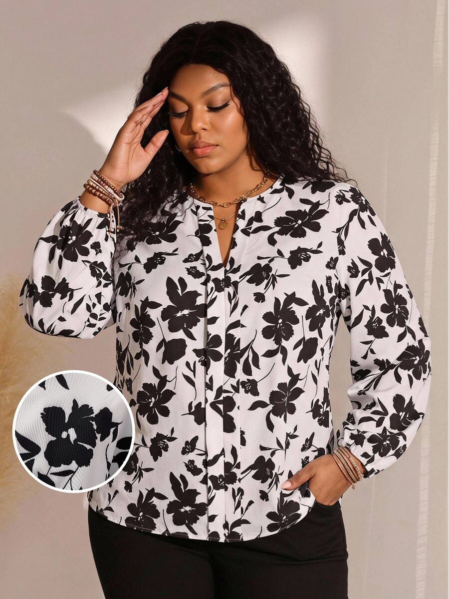 EMERY ROSE قميص أنيق بطبعة زهرية وياقة على شكل حرف V مع فتحة علوية وأكمام طويلة وأزرار أمامية وربطة خصر مقاس كبير لخريف وشتاء 2026 - أبيض - مشاهدة 1