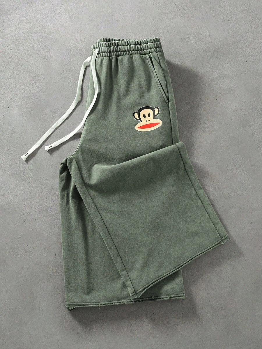 ROMWE MEN Paul Frank X ROMWE بنطال رياضي قصير مطبوع برسومات للرجال بأسلوب الشارع - أخضر - مشاهدة 1