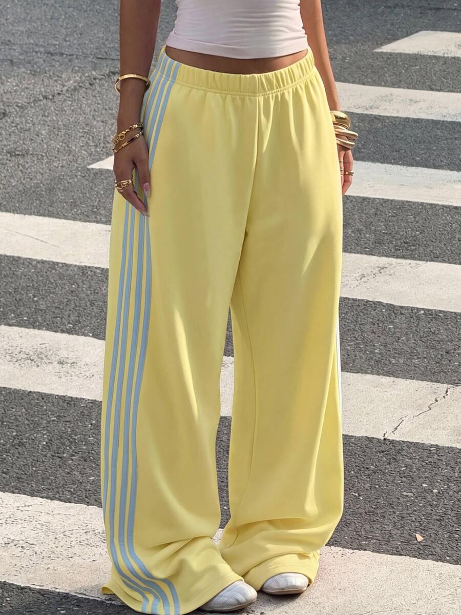 Muchica Plus Size Women's Colorblock Striped Elastic Waist Loose Sweatpants - Pale Yellow - View 1