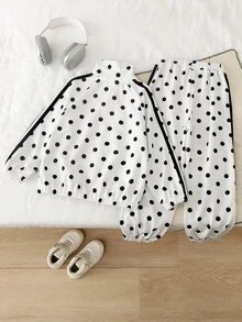 SHEIN Elladie kids 女童波點兩件套，白色底色配黑色波點印花，拉鍊開襟外套左側飾有黑色蝴蝶結印花，長褲配同款波點印花與鬆緊收口褲腳，袖口與褲腿飾有織帶飾邊，適合日常上學、社區散步、戶外出遊、購物與旅行 - 黑與白 - 查看 3