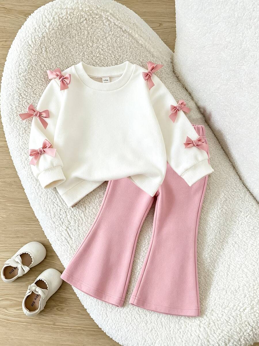 SHEIN Elladie kids مجموعة فتاة ذات طابع حلو وأنيق، تتكون من ملابس علوية بيضاء مزينة بفيونكة ثلاثية الأبعاد + بنطلون ذو قصة واسعة أسود، ملابس علوية سوداء مزينة بفيونكات وردية متعددة، بنطلون ذو قصة واسعة باللون الفوشيا، طابع حلو وأنيق مناسب للعودة إلى المدرسة والخروجات والأناقة الشارعية - متعدد الألوان - مشاهدة 1