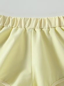 SHEIN Young Girls Yellow Textured Workout Set With Double Criss Cross Strap Back Sports Bra And 2 In 1 Running Shorts High Waist Activewear 2pc Outfit - Yellow - View 5