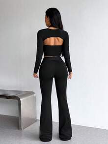 SHEIN Dewbera طقم رياضي من توب بدون ظهر بتصميم ملتوي وحمالة رقبة مع بنطال - الأسود - مشاهدة 2
