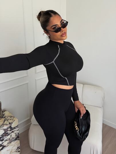 Maria Perezxox 明线插肩袖不对称下摆修身立领 T 恤