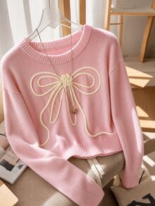 SHEIN 2026秋冬新款 8-12歲女童淺粉色圓領短版針織毛衣，奶油白3D粗繩蝴蝶結刺繡裝飾，落肩寬鬆長袖套頭衫，柔軟甜美內搭上衣，適合上學、出遊、拍照，春秋穿著 - 粉色 - 查看 2