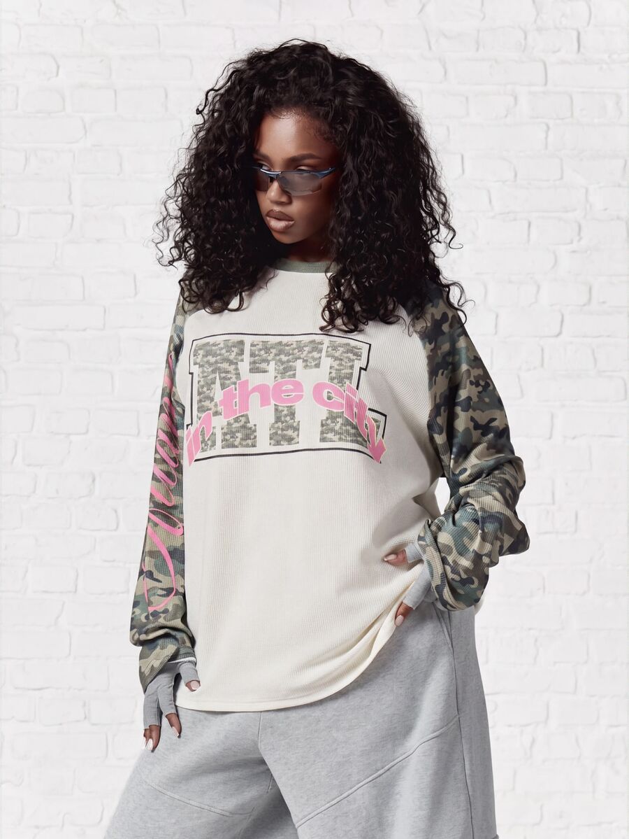 SUMWON WOMEN Oversized Raglan Long Sleeve Top With Camo Contrast Sleeves And Collegiate Graphic Print, Crew Neck, Color Block - Pink - View 1