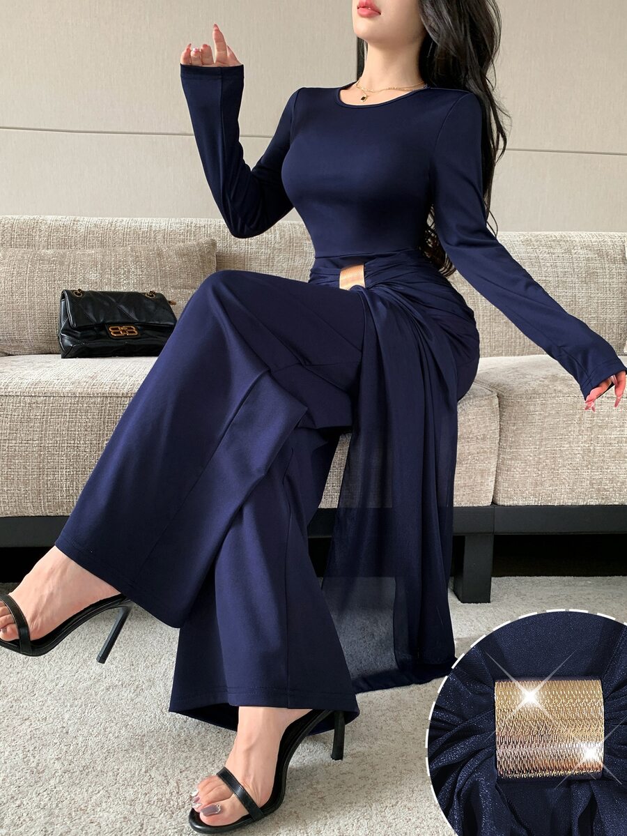 Modelyn Jumpsuit Lengan Panjang Kasual Wanita dengan Leher Bulat dan Dekorasi Logam untuk Sehari-hari