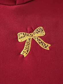SHEIN 青少年女孩休閒街頭風豹紋毛絨帽，豹紋印花、蝴蝶結刺繡，適合街頭穿搭與衛衣搭配 - 酒紅色 - 查看 5