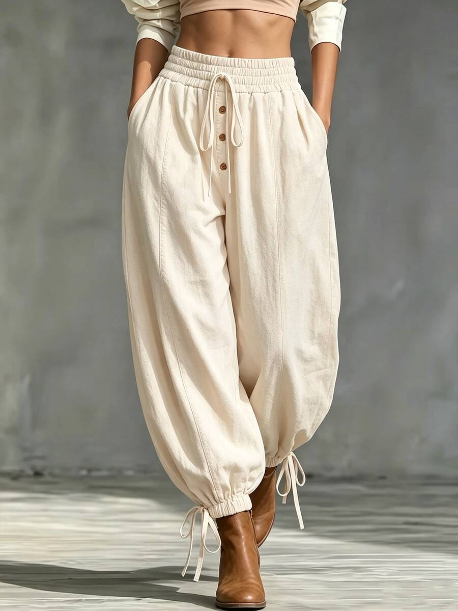 SHEIN Bagian pinggangnya menggunakan karet elastis + tali serut. Celana longgar model lentera ini cocok untuk dipakai sehari-hari. - Aprikot - View 1