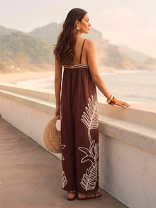 CAJUNI Women's V-Neck Spaghetti Strap Loose-Fit Jumpsuit With Brown Parrot Tropical Print, A Vacation Essential. - Brown - View 2