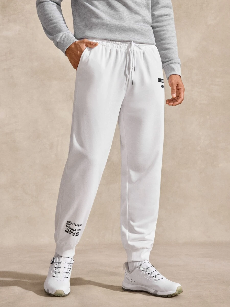 Courvante Loose Fit Men's Sweatpants With Slogan Graphic And Drawstring Waist Sweatpants Letter Plain Urban Fashion Joggers - White - View 1