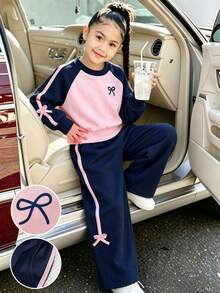 SHEIN 女童運動衫套裝 圓領短版套頭上衣 側邊條紋蝴蝶結裝飾 寬鬆長褲 秋季穿搭 時尚街頭風運動套裝 7歲生日 - 藏蓝色 - 查看 1