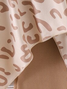 SHEIN 女童 2 件套，半高領長袖豹紋不對稱下擺針織上衣，搭配純色羅紋喇叭褲，柔軟彈性面料，休閒春/秋季兒童套裝 - 杏色 - 查看 7