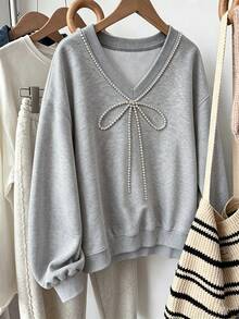 GlowEve CURVE Sweatshirt Longgar Wanita Abu-abu Leher V dengan Pita Mutiara, Model Santai dan Lembut, Ukuran Plus - Grey - View 3