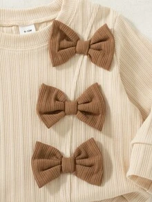 SHEIN Baby Girl Sweet & Cool Contrast Color Bow Decor Comfortable Asymmetrical Ribbed Light Apricot Long Sleeve Top + Brown Flared Long Pants Set, Autumn/Winter Stylish 2-Piece Outfit - Multicolor - View 6